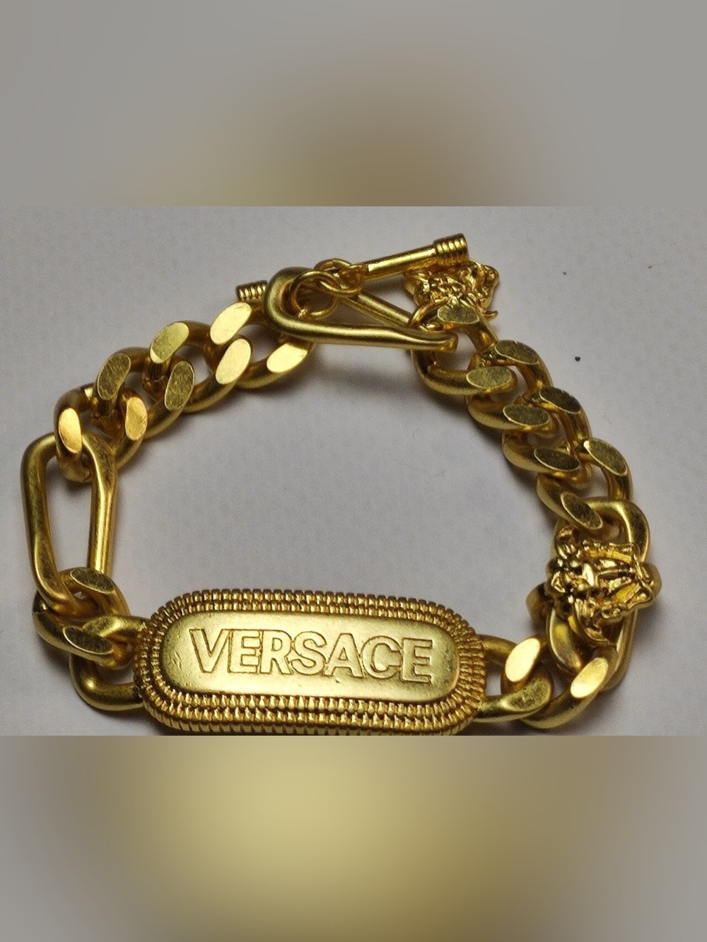Versace unisex  Gold Plated Logo Link Bracelet